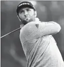  ?? DENIS POROY/AP ?? Spaniard Jon Rahm tees off during the third round Saturday at Torrey Pines.