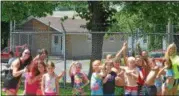  ?? NICHOLAS BUONANNO-NBUONANNO@TROYRECORD.COM ?? Kids and staff from the Watervliet Civic Center enjoy opening day at Veterans Memorial Swimming Pool in Watervliet Monday afternoon.