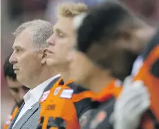  ?? GERRY KAHRMANN ?? CFL commission­er Randy Ambrosie, left, has changed the CFL’s video replay rule mid-season to limit coaches’ challenges to just one per game.