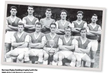  ??  ?? Norman Rigby (holding trophy) with the 1960-61 Fourth Division champions.