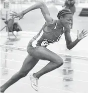  ?? STEPHEN M. DOWELL/STAFF PHOTOGRAPH­ER ?? Shakima Wimbley takes off in the 400-meter dash during the Class 3A FHSAA Track and Field Finals for Dillard High in 2013.