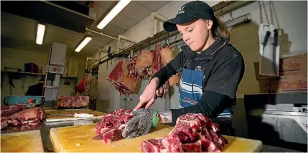  ?? SIMON O’CONNOR/STUFF ?? Kayla Scott started as a dish hand and is now an apprentice at the Kiwi Butcher Shop in New Plymouth.