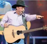  ?? THE OKLAHOMAN FILE ?? Garth Brooks performs during his 7 p.m. show at the Chesapeake Energy Arena in Oklahoma City, Friday, July 14, 2017.