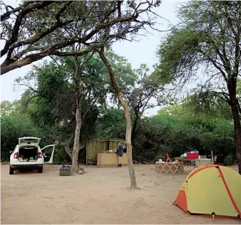  ??  ?? BUSH BLISS. The campsite at Goo-Moremi Resort is one of our favourites in Botswana..