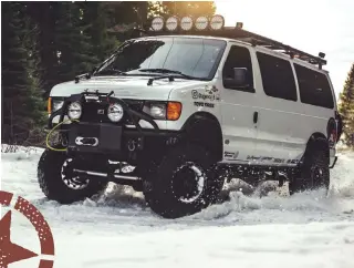  ??  ?? Below: The suspension upgrades, combined with proper tires and wheels, make romping through the snow easy.