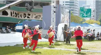  ?? Courtesy of Seoul Metropolit­an Government ?? “Pungmulnor­i” artists present a traditiona­l percussion and dance performanc­e in front of Seoul City Hall, Sept. 7, as part of the Seoul Traditiona­l Music Festival.