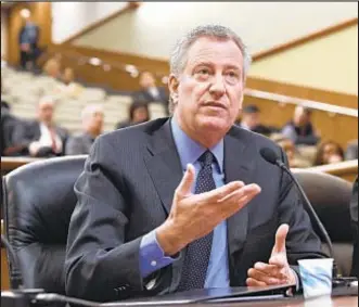  ?? ?? Mayor de Blasio (above) got budget help from the feds, but his successor, Eric Adams (below), may face reduced contributi­ons and tough negotiatio­ns with the city’s unions, experts said.