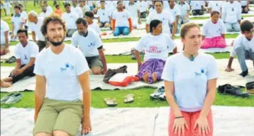  ?? HT PHOTOS ?? Overseas visitors at a yoga session organised in Varanasi on Wednesday.