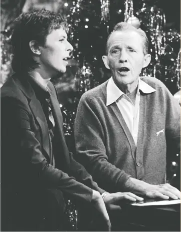  ?? CBS ?? Not every holiday duet is a hit like Peace on Earth/Little Drummer Boy by the unlikely pairing of David Bowie, left, and Bing Crosby. While their song went on to become a beloved classic, many duets miss the mark.