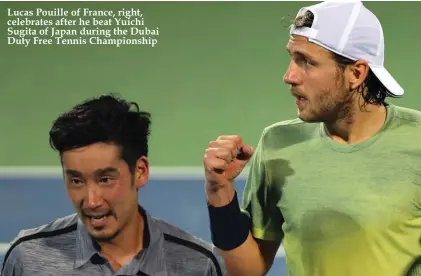  ??  ?? Lucas Pouille of France, right, celebrates after he beat Yuichi Sugita of Japan during the Dubai Duty Free Tennis Championsh­ip