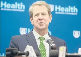  ?? MICHAEL HOLAHAN/AP ?? Georgia Gov. Brian Kemp said MLB“caved to fear and lies from liberal activists”when it yanked the All-Star Game from Atlanta’s Truist Park.