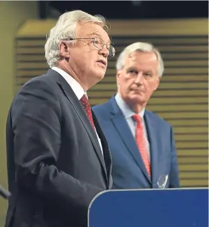  ?? Picture: Getty. ?? David Davis and Michel Barnier brief the media in Brussels.