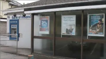  ??  ?? The bank of Ireland in Taghmon: a poster behind the glass outlines the changes to the counter service.