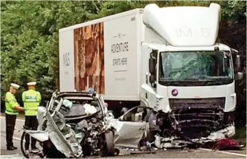  ??  ?? Fatal collision: Mrs Baker-Lockett’s car struck a Marks & Spencer lorry head-on
