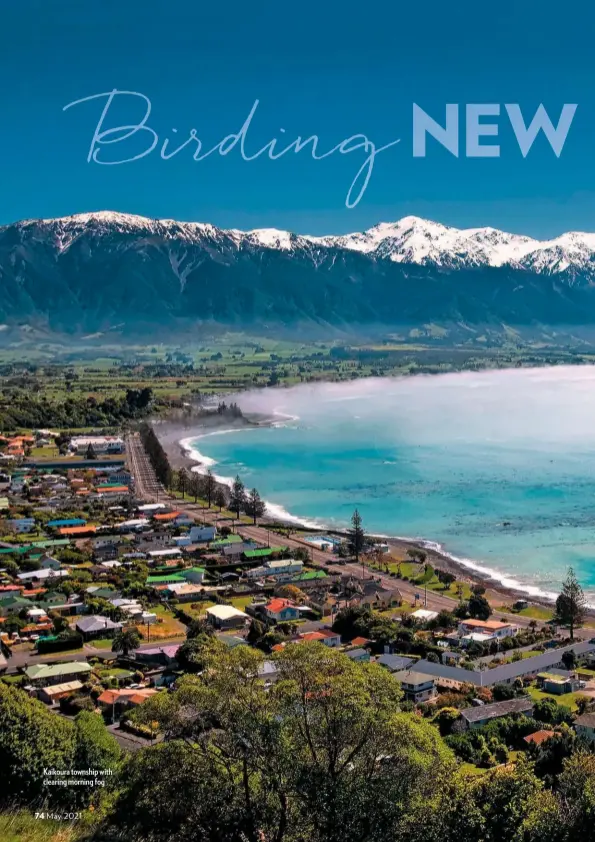  ??  ?? Kaikoura township with clearing morning fog