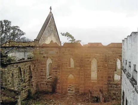  ?? Picture: CAMERON KRETSCHMAN­N ?? ABANDONED RUINS: A weak winter sun rises above Izeli Convent outside King William’s Town, revealing the ruins of a once-beautiful church. Izeli was first built as a home for Dominican sisters who would also take care of abandoned and orphaned children....