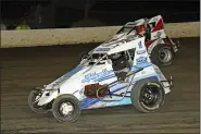  ?? RICH KEPNER - FOR MEDIANEWS GROUP ?? Billy Pauch Jr. (1) and Billy Pauch Sr. (R7) race at Grandview on Sunday.