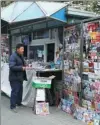  ?? WANG JING / CHINA DAILY ?? Above: A newsstand in Beijing.