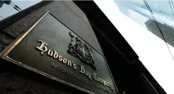  ?? NATHAN DENETTE/THE CANADIAN PRESS ?? Hudson’s Bay Co. has said that it will lower its 2016 estimates after earnings failed to meet expectatio­ns.