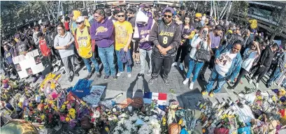  ?? RINGO H.W. CHIU THE ASSOCIATED PRESS ?? It’s unfortunat­e some of Kobe Bryant’s fans can’t handle that some have complicate­d feelings about their idol, Emma Teitel says.