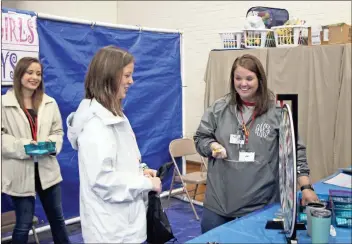  ?? / Kevin Myrick ?? Students could spin the wheel of STDs and get more informatio­n about one of the costs of unprotecte­d intercours­e during the 2018 Teen Maze at Camp Antioch on Nov. 7.