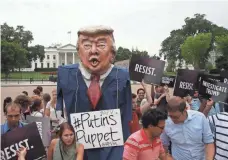  ?? MARK WILSON, GETTY IMAGES ?? The group MoveOn.org organized a protest against President Trump in front of the White House on July 11.