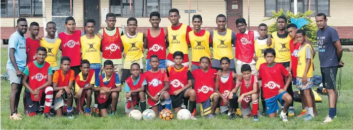  ?? Picture:ATU RASEA ?? Rewa Primary Schools football squad members and their coaches during a training session at the Saraswati Primary School ground in Nausori yesterday.