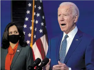  ?? CAROLYN KASTER THE ASSOCIATED PRESS ?? President-elect Joe Biden, joined by Vice-President-elect Kamala Harris, called on Americans to separate politics from the virus and embrace wearing masks during a Monday press conference.