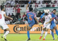  ?? AFP ?? India defender Sandesh Jhingan tries to clear the ball during the Asian Cup Group A match against Bahrain in Sharjah