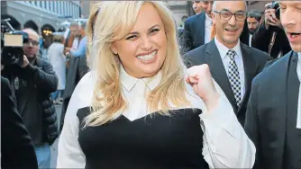  ?? Picture: REUTERS ?? ON TOP: Australian comedian and actor Rebel Wilson reacts as she leaves the Victorian Supreme Court in Melbourne, Australia, after she won a defamation case on Thursday