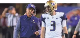  ?? JOE CAMPOREALE/USA TODAY ?? Coach Chris Petersen and quarterbac­k Jake Browning (3) lead Washington.