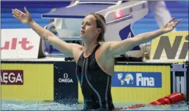  ?? LEE JIN-MAN — THE ASSOCIATED PRESS ?? Italy’s Federica Pellegrini celebrates after winning the women’s 200m freestyle final at the World Swimming Championsh­ips in Gwangju, South Korea, Wednesday.