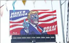  ??  ?? A giant billboard shows a drawing depicting Trump, along Periferico avenue in Mexico City, Mexicom. — Reuters photo
