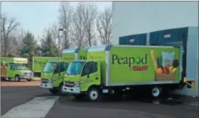  ?? DIGITAL FIRST MEDIA FILE PHOTO ?? Peapod by Giant has expanded its online grocery shopping and delivery in Berks County — making the service available in Exeter and Birdsboro. In this file photo Peapod trucks are ready to be loaded at the North Coventry Giant Food store on Glocker Way....