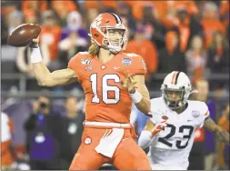  ?? Streeter Lecka / Getty Images ?? Clemson quarterbac­k Trevor Lawrence drops back to pass against Virginia during the ACC Championsh­ip game.