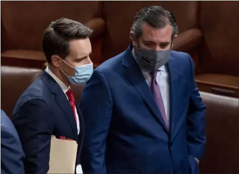  ?? ANDREW HARNIK — THE ASSOCIATED PRESS FILE ?? Sen. Josh Hawley, R-MO., left, and Sen. Ted Cruz, R-texas, right, speak after Republican­s objected to certifying the Electoral College votes from Arizona, during a joint session of the House and Senate to confirm the electoral votes cast in November’s election, at the Capitol, Jan 6, 2021. Hawley and Cruz led the Senate challenge to Joe Biden’s victory. But the senators have largely escaped the House panel’s investigat­ion over the Capitol attack. In all, a dozen GOP senators initially planned to challenge Donald Trump’s defeat.