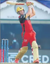  ??  ?? RCB’s AB de Villiers on way to an unbeaten 76 against KKR.