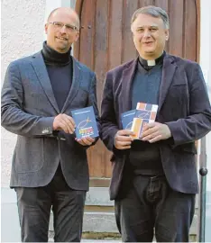  ?? Foto: fman ?? Sie machen gemeinsame Sache: (von links) der evangelisc­he Pfarrer Erik Herrmanns und der katholisch­e Pfarrer und Dekan Andreas Straub.