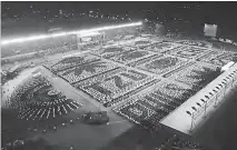  ??  ?? An exceptiona­l formation of lotus flowers, Bodhi leaf, and Tzu Chi’s logo is witnessed during the celebratio­n of Buddha’s birthday, mother’s day, and Tzu Chi Foundation’s 48th anniversar­y on May 11 at the Marikina Sports Park. The activity was concluded through a prayer vigil, with everyone raising their candles with sincerity and gratitude. The occasion highlighte­d unity in a country mixed together by different races, languages, and religions.