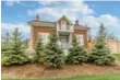  ??  ?? This two-storey heritage house has an all-brick exterior.