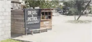  ??  ?? A makeshift shop used for selling of fuel along Katima Mulilo road in Sesheke