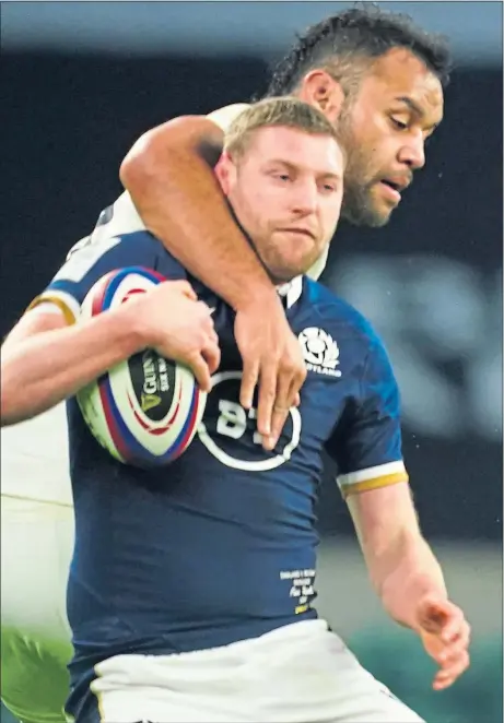  ??  ?? England’s Billy Vunipola was yellowcard­ed for this high tackle on Finn Russell