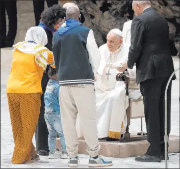  ?? Gregorio Borgia
The Associated Press ?? Pope Francis meets with refugee families from Syria, Afghanista­n, Rwanda and Ukraine on Saturday at the Vatican. The pope spotlighte­d legal migration routes over smuggling.