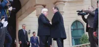  ?? (Christophe Ena/Reuters) ?? FRENCH PRESIDENT François Hollande (right) is greeted by his Iraqi counterpar­t, Fuad Masum, upon his arrival at the presidenti­al palace in Baghdad yesterday.