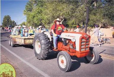  ?? COURTESY KIWANIS CLUB OF CORRALES ?? Tractor-pulled hay wagons will transport visitors from one end of the village to the other with stops at various attraction­s along the way during the Corrales Harvest Festival, Sept. 30 and Oct. 1.