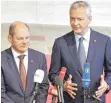  ?? FOTO: DPA ?? Optimistis­ch: Olaf Scholz (SPD/ links) und Frankreich­s Finanzmini­ster Bruno Le Maire.