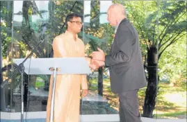  ??  ?? Mayor John Carter was the first to congratula­te Harikrishn­an Bhaskaran Pillai on his new status as a New Zealand citizen at Te Ahu in Kaitaia last week. Mr Bhaskaran Pillai, now living in Kaikohe, was one of 17 people from nine countries who swore, by oath or affirmatio­n, to be faithful and bear true allegiance to Her Majesty Queen Elizabeth the Second, Queen of New Zealand, her heirs and successors, according to law, to faithfully observe the laws of New Zealand and fulfil their duties as a New Zealand citizen, Mr Carter telling them they had chosen to make their homes in the best part of the best country in the world.
Page 4 — A Kiwi at last!