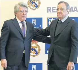  ??  ?? Atletico Madrid president Enrique Cerezo, left, and Real Madrid president Florentino Perez.