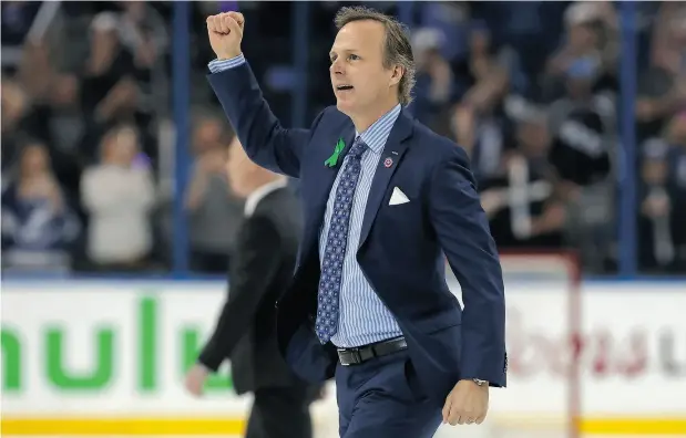  ?? MIKE CARLSON / GETTY IMAGES ?? Jon Cooper, head coach of the Tampa Bay Lightning, is believed to have one more year remaining on a multi-year extension he signed in 2015.