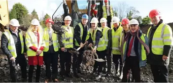  ??  ?? Minister of State Damien English turns the sod on the housing developmen­t at Knappaghmo­re.